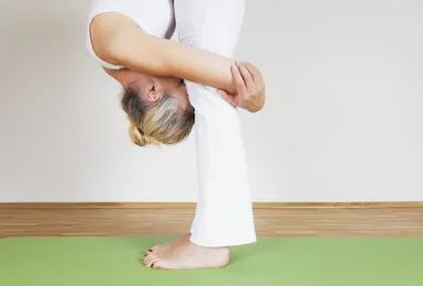 Standing Forward Bend Pose in Yoga, Standing Forward Bend Pose in Yoga Variation, neck and shoulder pain relief