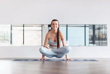 Tulasana-Lotus-Pose-Variation-Scale-Pose-Yoga